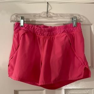Hot pink IVIVVA by lululemon shorts
Size 14 (kids)